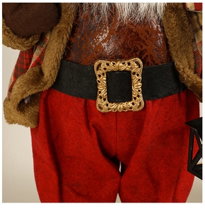 Close-up of a Santa doll showing the detailed red felt fabric and golden belt buckle