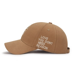 Khaki cotton baseball cap with white embroidery featuring a classic curved brim design