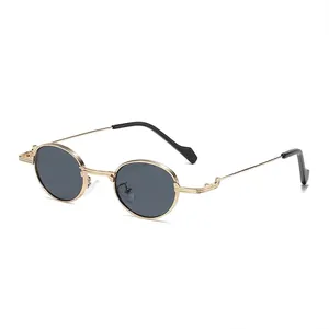 Retro round metal frame sunglasses with dark lenses and minimalist golden finish