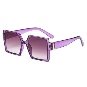 Retro oversized square sunglasses in transparent purple with gradient lenses and gold accents