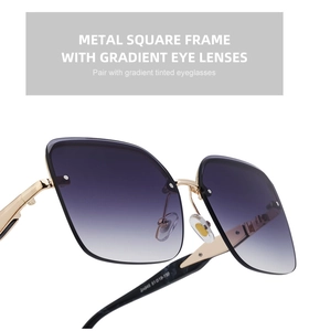 Detailed macro view of gold metal temples and gradient lenses on oversized sunglasses