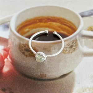 French style 925 silver adjustable ring with a round shimmering moonstone on a cup rim