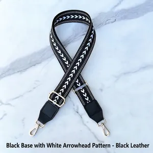 Adjustable wide replacement strap with black and white geometric arrow patterns and gold hooks