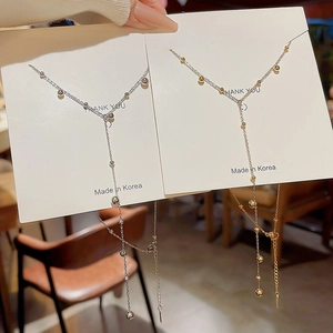 Elegant gold and silver Y-shaped long tassel necklaces with glossy round beads and fine chains