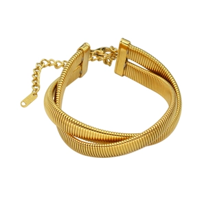 Detail view of 18K gold double snake chain bracelet with K18 hallmark on the clasp