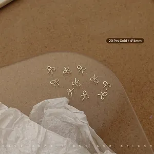 Detail of 20pcs 4x4mm mini golden alloy bow nail charms for DIY manicure art decoration