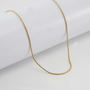 Minimalist 18K gold plated stainless steel S-link chain necklace on white background