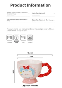 Detail view of a 400ml ceramic mug with embossed bear design and red twisted handle
