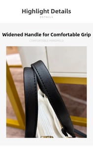 Detail shot of the widened black faux leather handle with fine stitching on white tote bag
