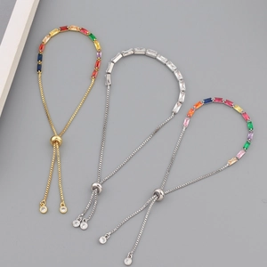 Detailed macro view of adjustable tennis bracelets with colorful zircon stones and slider clasp