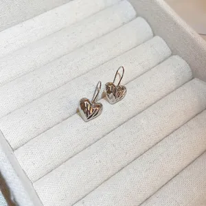 Minimalist silver pleated heart drop earrings with simple hook design for women