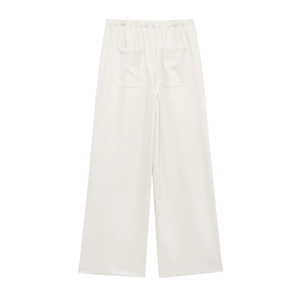 Detail of high waist elastic waistband and back pockets on off-white straight-leg trousers