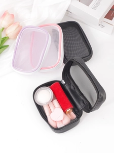 Three mesh travel makeup bags in pink, purple and black with zipper closure