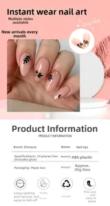 Detail of almond-shaped press-on nails with leaf patterns and gold foil flakes