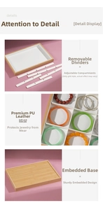 Detail of wooden jewelry tray with white PU leather lining and removable dividers