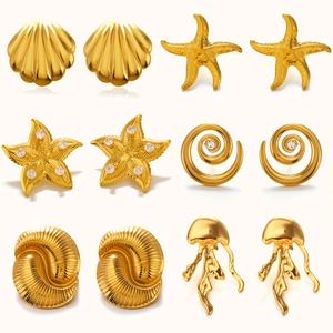 Set of six gold beach-themed earrings featuring seashell, starfish and jellyfish shapes