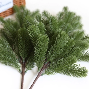 Realistic PE artificial pine branch decoration with vibrant green needles for Christmas