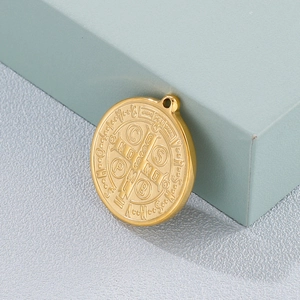 Golden St. Benedict medal pendant in titanium steel with detailed religious relief engraving