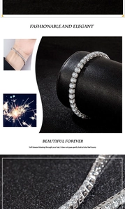 Detailed macro view of a classic silver tennis bracelet featuring radiant round-cut cubic zirconia