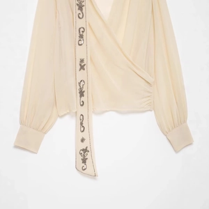 Women's chic beige georgette scarf shirt with elegant beaded embroidery and wrap v-neck