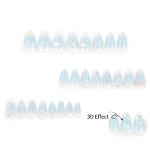 Blue gradient almond press-on nails with 3D laser hearts and silver star decorations