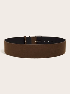 Detail of a brown suede wide belt for women featuring a square silver metal buckle