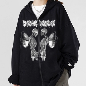 Close-up of spider web print and gothic text on black zip-up street hoodie