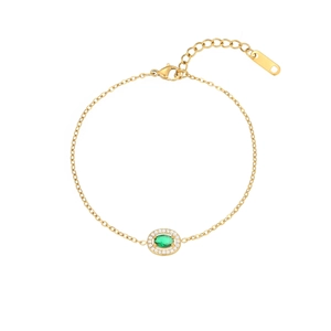 Detailed shot of golden link bracelet featuring oval green gemstone with halo diamonds