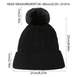 Tableau des tailles détaillé pour le bonnet en maille noire avec pompon en fausse fourrure
