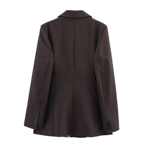 Back view of a deep brown double-breasted blazer with padded shoulders and sleek tailoring