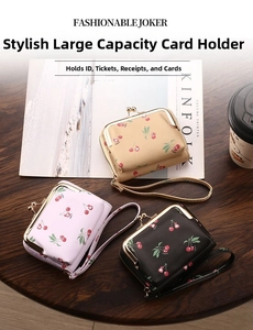 Detailed view of women's cherry print leather card holders in beige, pink and black