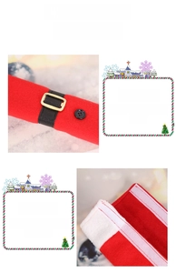 Close-up of Christmas fridge handle cover with plush red fabric and a black belt buckle