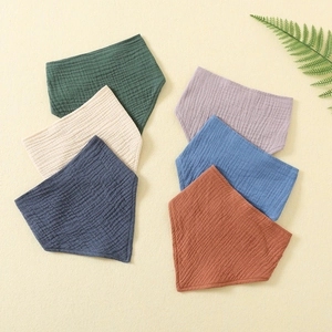 Set of six colorful double-layer muslin gauze baby bibs in soft cotton fabric