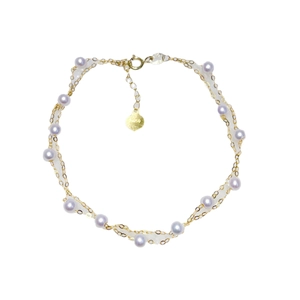 Elegant 18k gold layered bracelet with natural round purple pearls and fine gold chain