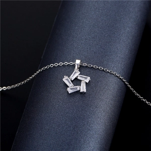 Silver star necklace with sparkling zircon rectangular stones on a sleek metal chain