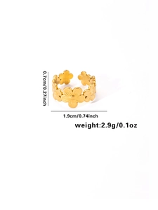Macro view of gold flower ring with 0.7cm height and 1.9cm inner diameter specs