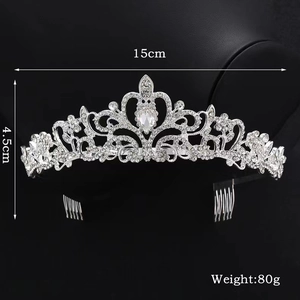 Detailed view of silver crystal crown with dimensions 15cm width and 80g weight