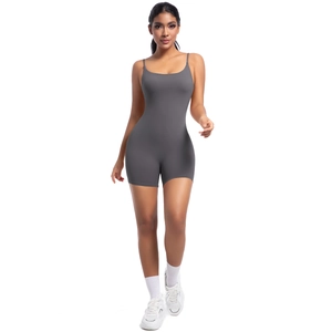 Front view of dark grey slim fit yoga bodysuit with thin straps and athletic design