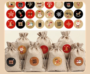 Detail of 24 Christmas advent calendar jute bags with numeric stickers and festive patterns