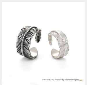 Detail showing smooth polished inner walls and rounded edges of silver feather rings