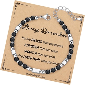 Detail view of handmade beaded bracelet with black matte stones and silver metal beads