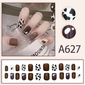 Cow print and chocolate brown press-on nails set with square shape and glossy finish