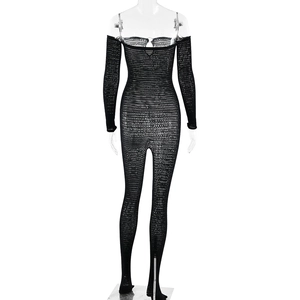 Detail of black off-shoulder mesh bodysuit with hollow-out knit texture and long sleeves