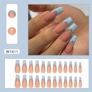 Faux ongles amande style français bleu avec paillettes argentées et 24 pièces