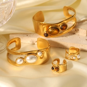 Vintage hollow gold stainless steel cuff bracelet with pearl and tiger eye stone accents