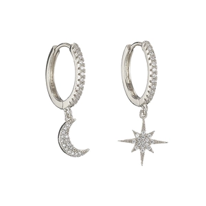 Asymmetric silver moon and star earrings with cubic zirconia pavé in huggie style