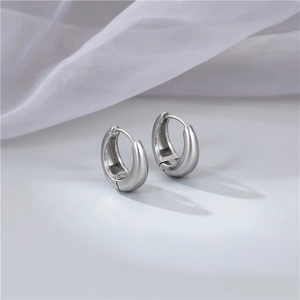 Minimalist silver U-shaped hoop earrings with a polished mirror finish for women