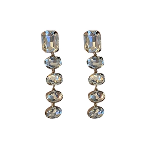 Elegant gold drop earrings with rectangular and oval crystals in a vertical tassel style
