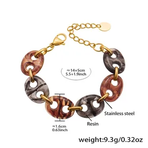 Detail of 14+5cm stainless steel bracelet with resin links and lobster clasp closure