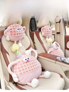 Detailed view of pink lamb fleece monster car headrest pillow and lumbar support set